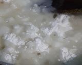 A picture of step 2 of Garlic rice balls and baked beans.