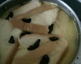 Foto langkah ke 3 dari resep Puding Roti Kismis.