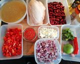 A picture of step 1 of Mexican tomato, chicken and refried bean soup.