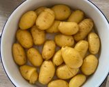 A picture of step 3 of Hasselback truffle roasted potatoes.