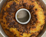 Foto del paso 6 de la receta: Bizcocho de yogur y naranja con chispas de chocolate en freidora de aire