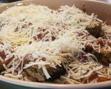 A picture of step 8 of Zuccinni Parmesean.