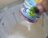 A picture of step 4 of Coconut rum punch.