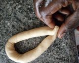 A picture of step 7 of Kkwabaegi(twisted korean doughnut).