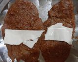 A picture of step 3 of Stuffed cheesy chicken.