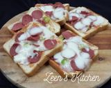 A picture of step 5 of Microwave Pepperoni Bread Pizzas.