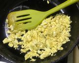 A picture of step 3 of Kung pao chicken with egg fried rice.