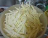 Foto del paso 9 de la receta: Jamoncitos de pollo adobados y asados en freidora de aire con salsa de Cola-Cola y papas fritas