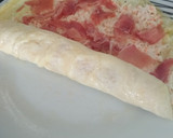 Foto del paso 3 de la receta: Rollitos de tortilla con surimi y jamón