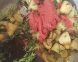A picture of step 8 of Coconut green peas with potatoes.