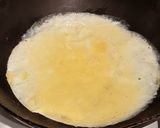 A picture of step 7 of Curry Chicken Egg Cheese Tortilla Wrap.
