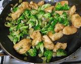 A picture of step 5 of Broccoli and Chicken Breast with Butter Soy Sauce Stir-Fry.