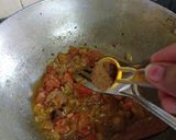 A picture of step 11 of Dahi wali bhindi.
