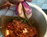 A picture of step 6 of Brinjal Patchadi.