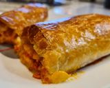 A picture of step 5 of Puff Pastry Roll Filled with Marinated Pork Loin and Cheese.