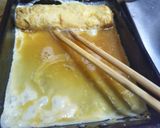 A picture of step 9 of Tamagoyaki (Sushi-Style Sweet Omelet).