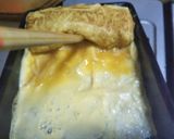 A picture of step 11 of Tamagoyaki (Sushi-Style Sweet Omelet).