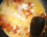 A picture of step 4 of Eggs with carrots.