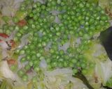 A picture of step 2 of Cabbage green peas sabzi.