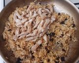 Foto del paso 4 de la receta: Arroz con curry, pollo y pasas