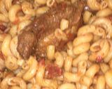A picture of step 5 of Macaroni with fried chicken and sausage.