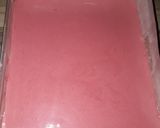 A picture of step 6 of Strawberry milk cake with whipped cream frosting.