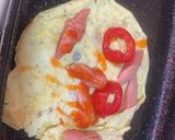 A picture of step 2 of Tortilla and egg sausage wrap.