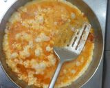 A picture of step 5 of Eggs with tomatoes.