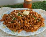 A picture of step 10 of Butter chicken pasta.