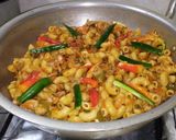 A picture of step 12 of Spicy Chicken and vegetable pasta.