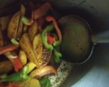 A picture of step 2 of Capsicum and potato ki sabzi.