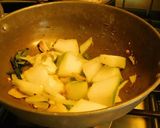 A picture of step 5 of Ash gourd mung dal Poricha Koottu.