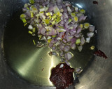 Foto del paso 4 de la receta: Arroz meloso de alcachofas y conserva de pota en su tinta