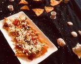 A picture of step 4 of Veg Nachos with cheesy Dip.