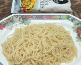 A picture of step 1 of Schezwan Egg Sausage Noodles.