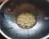 A picture of step 2 of Kathiyawadi Masala Khichdi.