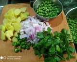 A picture of step 2 of Aloo matar poha.