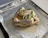 A picture of step 2 of Garlic Butter Roast Chicken with herbs.