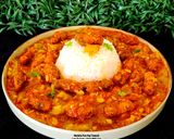 A picture of step 7 of Methi Muthiya Tameta Galka Nu Shaak - Fist-Shaped Fried Methi Dumpling In Sponge Gourd Tomato Curry.