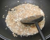 A picture of step 6 of Singapore fried carrot cake.