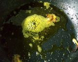 A picture of step 2 of Kancha Aam and Sorse chicken.