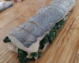 Foto del paso 9 de la receta: Merluza rellena de espinacas con langostinos y pasas