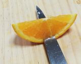 A picture of step 5 of How to Cut Citrus Fruits Like Oranges: Smile Cut.