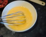 A picture of step 14 of Omurice (Omelette rice).