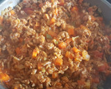 Foto del paso 3 de la receta: Pimientos tricolor rellenos de carne, verduras y arroz