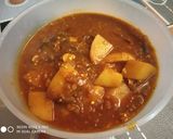 A picture of step 7 of Aloo Baingan Curry.