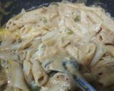 A picture of step 4 of Creamy pasta in periperi sauce.