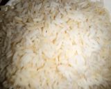 A picture of step 3 of Fried rice an chicken.