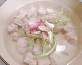 A picture of step 2 of Thai Spicy and Sour Pork Rib Soup.