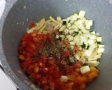 A picture of step 4 of Burnt chilli garlic rice with baked beans gravy.
